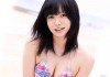 みなみ愛梨が反り返ったチンポを金玉の方から舐め上げる